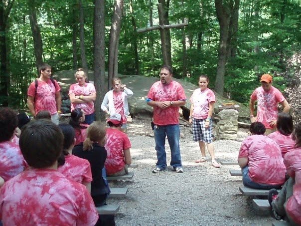 Eric Dingler as Camp Director standing in front of the staff during a staff training session.
